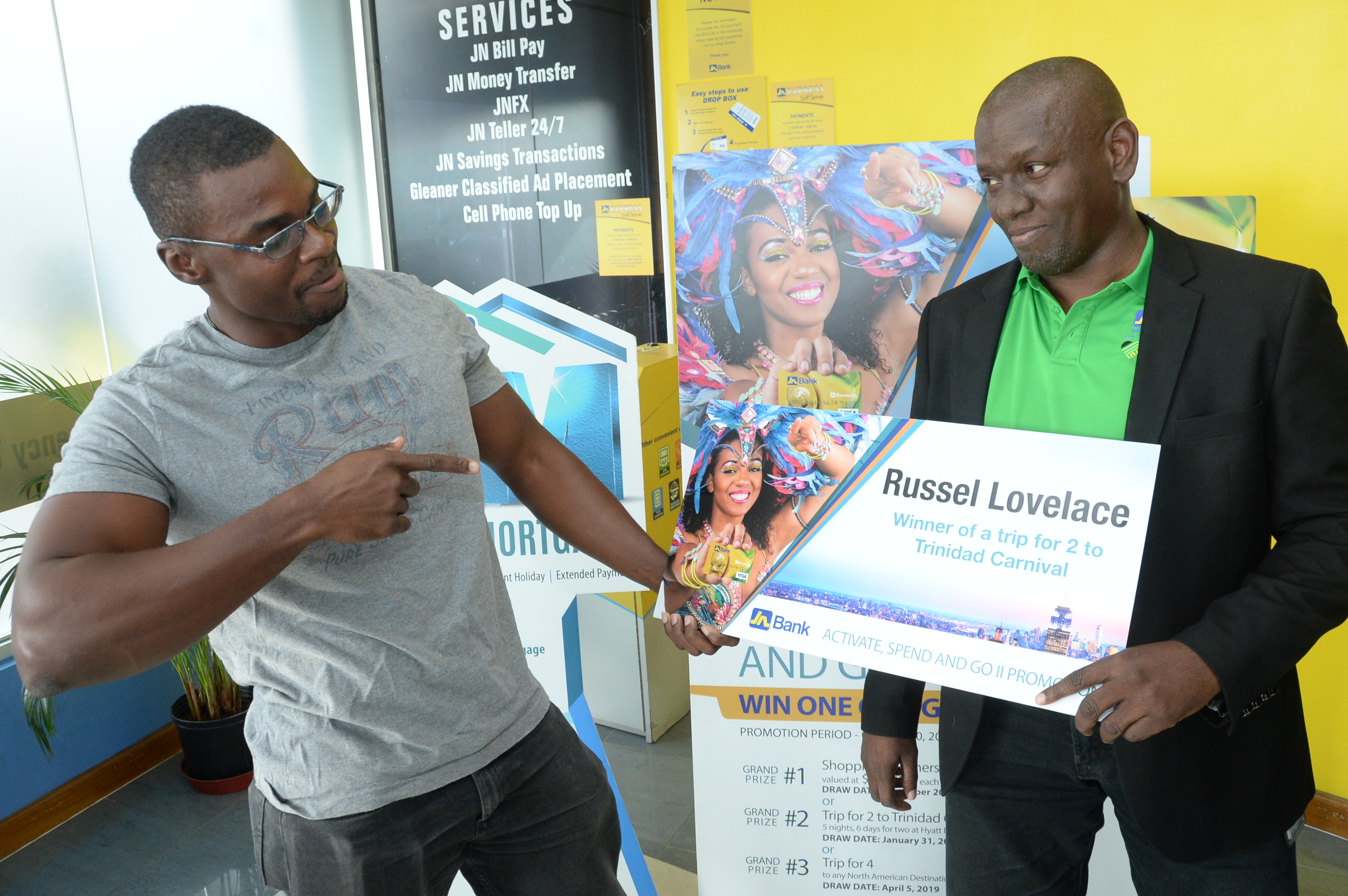 Like many soca lovers, “playing mas” in Trinidad and Tobago Carnival has been a life-long dream for Russell Lovelace. Thanks to JN Bank, he can now cross this item off his ‘bucket list,’ as come March 4 and 5, the 24-year-old will be among thousands of revelers prancing and masquerading through the streets of Port-of-Spain. On Friday, February 22, Mr Lovelace was presented with the grand prize of an all-expense paid trip for two, to Trinidad Carnival, after simply activating and spending approximately $10,000 with his JN Bank VISA credit card. “This is a dream come true. I have been a soca fan all my life; and going to Trinidad Carnival was one of the things I’ve always wanted to experience,” he said. “My girlfriend is even more ecstatic about this trip than I am; and, we are planning to have a great time together.” Mr Lovelace, who describes himself as a “technician by day” and a “soca-warrior by night,” will depart Jamaica with his girlfriend, Sashay Salmon, on Thursday, February 28. They will spend six days and five nights at the Hyatt Regency in Port-of-Spain, courtesy of JN Bank. As part of their prize package, they will also receive US$500 spending money, pre-paid tickets to three carnival fetes, and two free carnival costumes. The Kingston-native said he is mostly looking forward to the road marches; as, he wants to compare how the Trinidad Carnival experience equates with the Jamaican Carnival. “I have always heard stories about Trinidad Carnival; and many persons say that it’s the “mother of all West Indian carnivals,” therefore, I am definitely looking forward to the experience. I have also never ‘played mas,’ but, have always watched from the sidelines; therefore, this will be a new and welcomed experience from all angles,” he related. Mr Lovelace, who is also a “gym fanatic” said he is physically ready for the carnival festivities, which can be a grueling test of endurance. “I always find time to work out at least three days a week, hence I definitely have the stamina to keep up with the road marches,” he said. He and Sashay are also planning to do some “sightseeing” in Trinidad prior to returning to Jamaica. The JN Bank’s “Activate, Spend and Go,” promotion is still open to persons with a JN VISA Credit Card. The promotion continues until April 5, 2019, when the third and final draw of a trip for four, to any North American destination via Jet Blue airline, will be made. The first draw under the promotion was made in December 2018, when three persons won gift vouchers valued at $150,000 each, for shopping sprees at Singer Jamaica and Megamart.